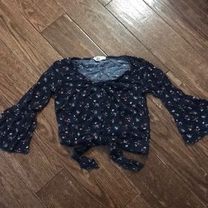 navy blue floral blouse with tie in front